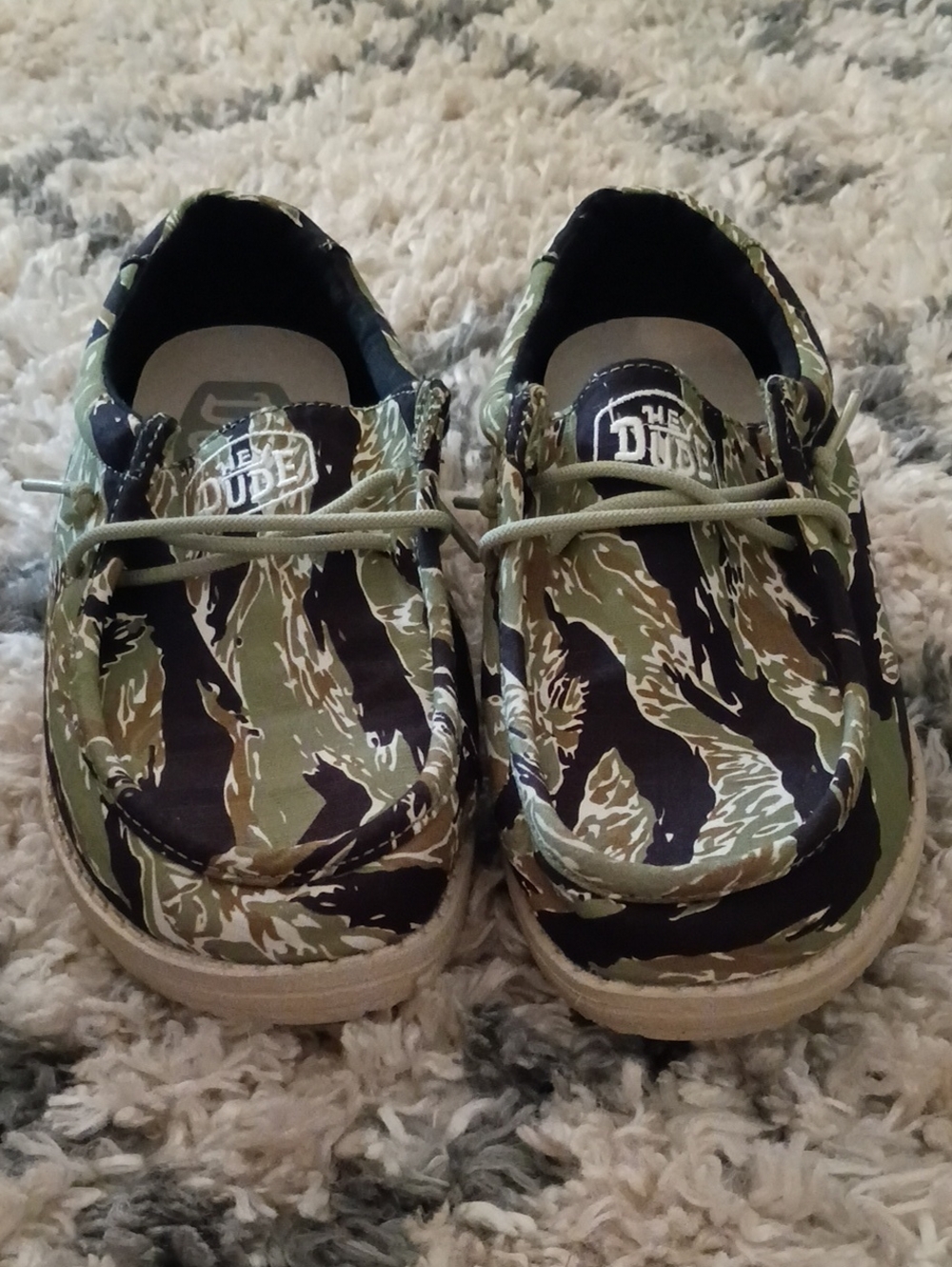 Hey Dude Kids Camo Slip-On Sneakers in Olive, Black, Tan